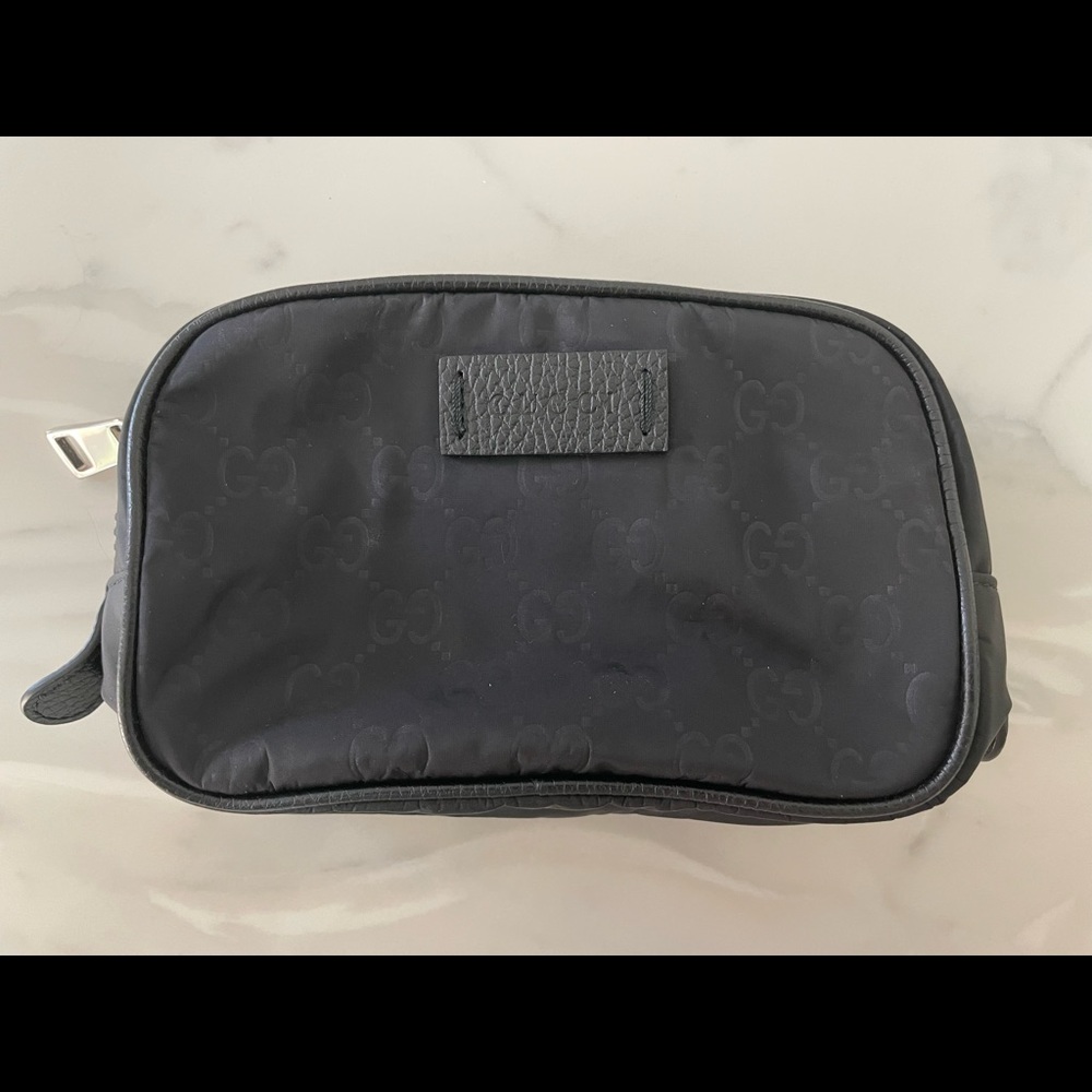 GUCCI
Black GG Nylon Cosmetic Pouch